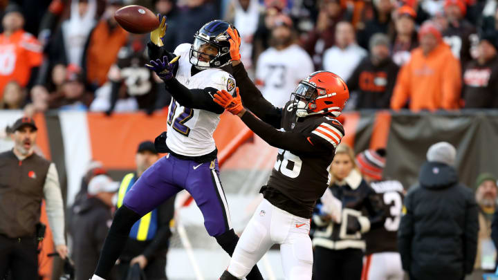 Rashod Bateman #12 of the Baltimore Ravens makes a catch against Greedy Williams #26 of the Cleveland Browns. (Photo by Mike Mulholland/Getty Images)