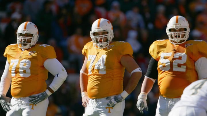 KNOXVILLE, TN – NOVEMBER 19: Ramon Foster #78, Richie Gandy #74 and Rob Smith #52 of the Tennessee Volunteers stand on the field during the game against the Vanderbilt Commodores on November 19, 2005 at Neyland Stadium in Knoxville, Tennessee. Commodores defeated the Volunteers 28-24. (Photo by Doug Pensinger/Getty Images)