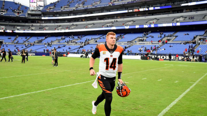 BALTIMORE, MD - OCTOBER 13: Andy Dalton #14 of the Cincinnati Bengals runs off the field after playing against the Baltimore Ravens at M&T Bank Stadium on October 13, 2019 in Baltimore, Maryland. (Photo by Will Newton/Getty Images)