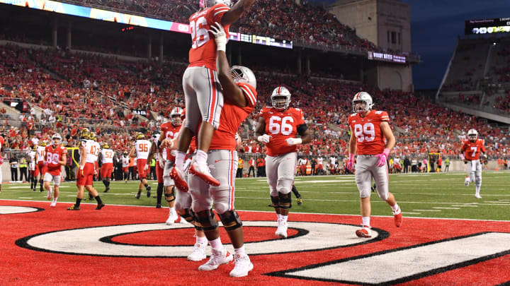 COLUMBUS, OH – OCTOBER 7: Antonio Williams #26 of the Ohio State Buckeyes celebrates in the end zone with Thayer Munford #75 of the Ohio State Buckeyes after scoring on an eight-yard touchdown run in the fourth quarter against the Maryland Terrapins at Ohio Stadium on October 7, 2017 in Columbus, Ohio. Ohio State defeated Maryland 62.14. (Photo by Jamie Sabau/Getty Images)