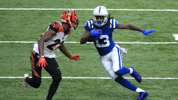 INDIANAPOLIS, INDIANA - OCTOBER 18: T.Y. Hilton #13 of the Indianapolis Colts runs the ball against William Jackson III #22 of the Cincinnati Bengals during the first half at Lucas Oil Stadium on October 18, 2020 in Indianapolis, Indiana. (Photo by Andy Lyons/Getty Images)