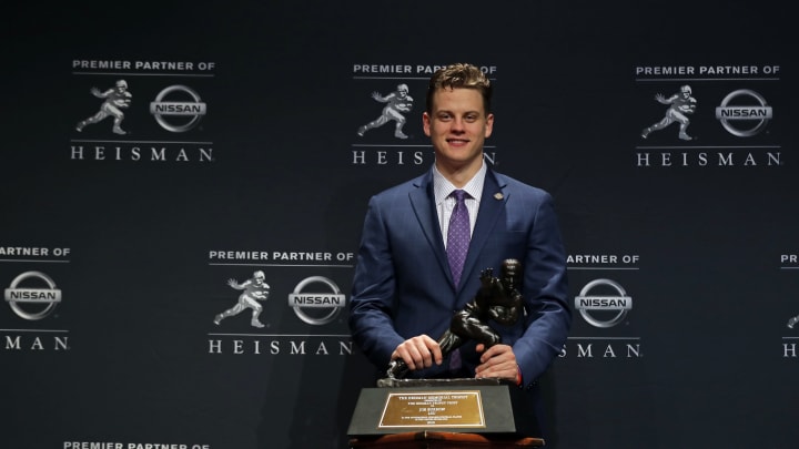 NEW YORK, NY – DECEMBER 14: Quarterback Joe Burrow of the LSU Tigers winner of the 85th annual Heisman Memorial Trophy poses for photos on December 14, 2019 at the Marriott Marquis in New York City. (Photo by Adam Hunger/Getty Images)