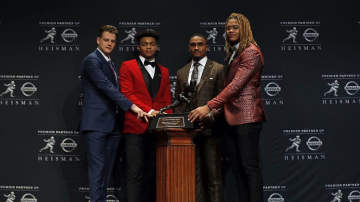 NEW YORK, NY - DECEMBER 14: (L-R) Finalists for the 85th annual Heisman Memorial Trophy, quarterback Joe Burrow of the LSU Tigers, quarterback Justin Fields of the Ohio State Buckeyes, quarterback Jalen Hurts of the Oklahoma Sooners and defensive end Chase Young of the Ohio State Buckeyes pose for a picture on December 14, 2019 in New York City. (Photo by Adam Hunger/Getty Images)