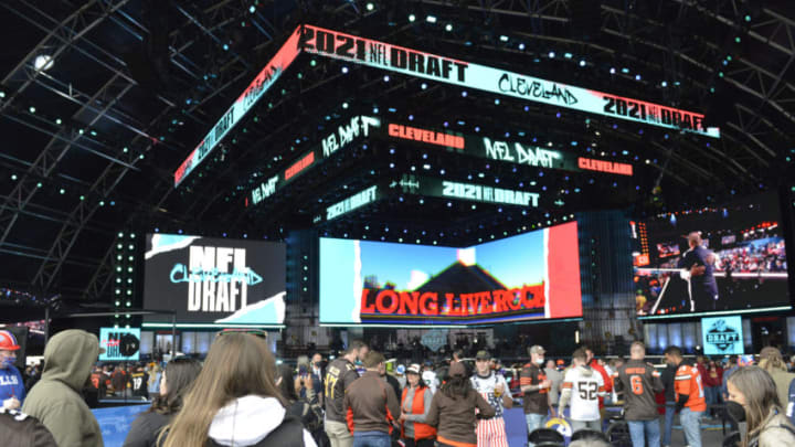 CLEVELAND, OHIO - MAY 01: Fans waiting for Machine Gun Kelly to perform onstage after the final round of the 2021 NFL Draft at the Great Lakes Science Center on May 01, 2021 in Cleveland, Ohio. (Photo by Duane Prokop/Getty Images)