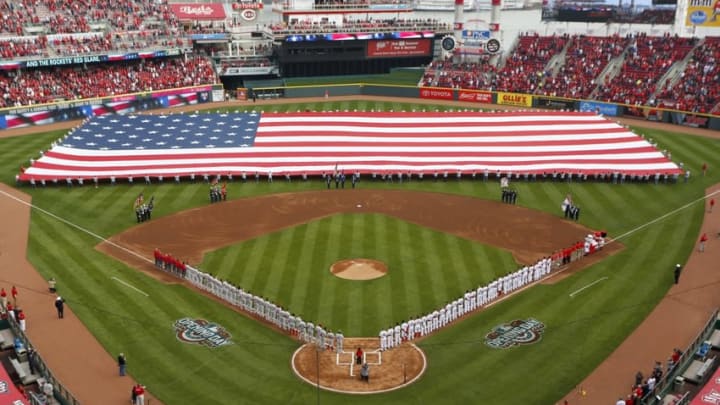 Apr 4, 2016; Cincinnati, OH, USA; General view during the national anthem as the Philadelphia Phillies and the Cincinnati Reds line up on the field during Opening Day ceremonies at Great American Ball Park. Mandatory Credit: David Kohl-USA TODAY Sports