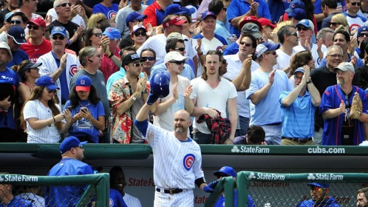 May 27, 2016; Chicago, IL, USA; Chicago Cubs catcher David Ross (3) tips his cap after hitting a three-run home run against the Philadelphia Phillies during the fourth inning at Wrigley Field. Mandatory Credit: David Banks-USA TODAY Sports