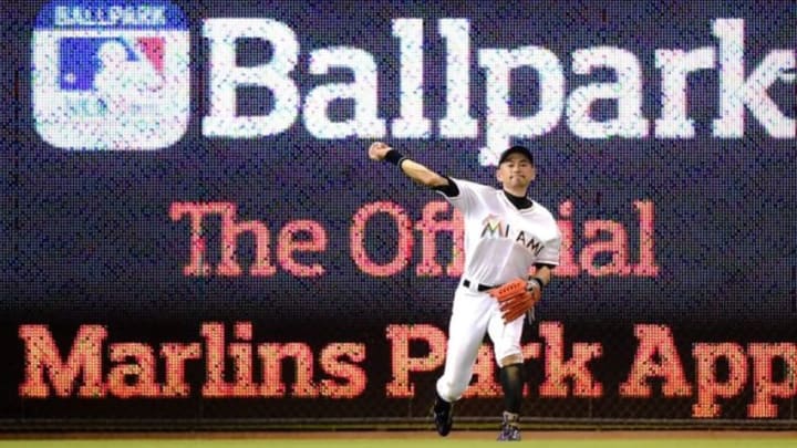 Sep 7, 2016; Miami, FL, USA; Miami Marlins left fielder Ichiro Suzuki (51) fields a play during the fifth inning against the Philadelphia Phillies at Marlins Park. Mandatory Credit: Steve Mitchell-USA TODAY Sports