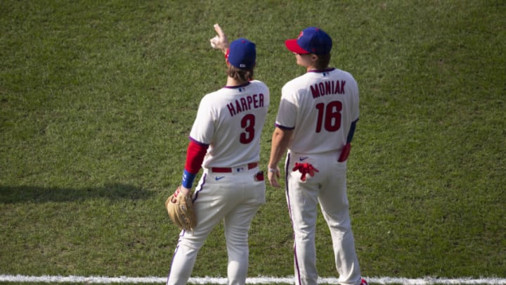 Bryce Harper #3 and Mickey Moniak #16 of the Philadelphia Phillies (Photo by Mitchell Leff/Getty Images)