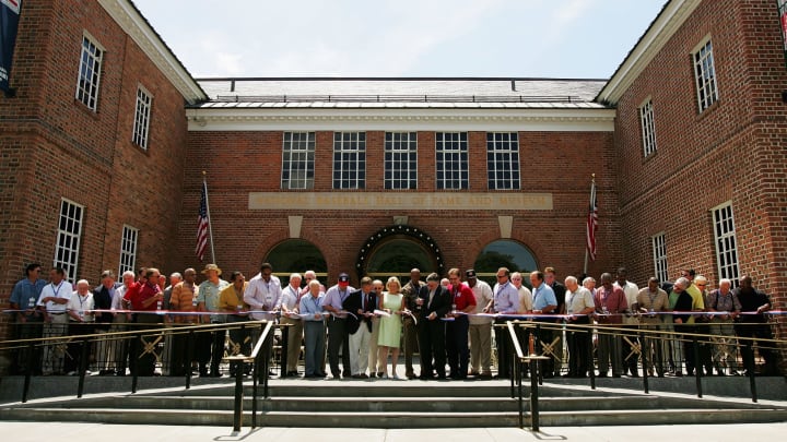 COOPERSTOWN, NY – JULY 29: 38 members of the Baseball Hall of Fame, along with board members and state senators cut a ribbon during a rededication ceremony at the National Baseball Hall of Fame and Museum on July 29, 2005 in Cooperstown, New York. Phillies (Photo by Ezra Shaw/Getty Images)