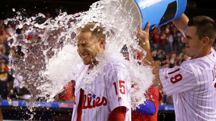 PHILADELPHIA, PA - JULY 29: Ty Kelly #15 of the Philadelphia Phillies is doused with water by Tommy Joseph #19 after hitting a game winning walk-off RBI single in the 11th inning during a game against the Atlanta Braves at Citizens Bank Park on July 29, 2017 in Philadelphia, Pennsylvania. The Phillies won 4-3 in 11 innings. (Photo by Hunter Martin/Getty Images)