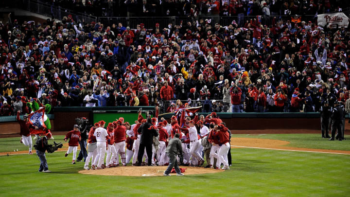 PHILADELPHIA – OCTOBER 29: The Philadelphia Phillies celebrate with their fans after they won 4-3 against the Tampa Bay Rays during the continuation of game five of the 2008 MLB World Series on October 29, 2008 at Citizens Bank Park in Philadelphia, Pennsylvania. (Photo by Jeff Zelevansky/Getty Images)