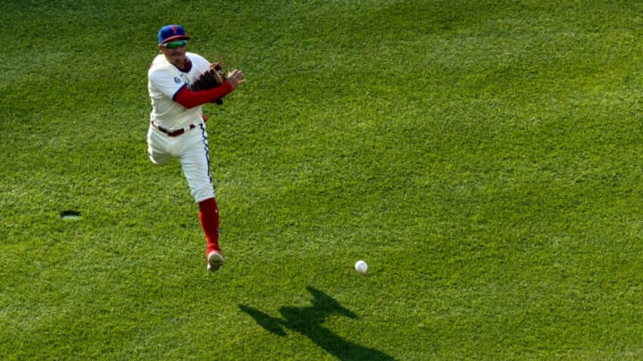 Jul 16, 2021; Philadelphia, Pennsylvania, USA; Philadelphia Phillies second baseman Ronald Torreyes (74) throws to first for an out against the Miami Marlins during the sixth inning at Citizens Bank Park. Mandatory Credit: Bill Streicher-USA TODAY Sports