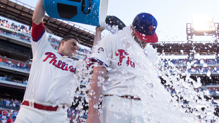 Jun 3, 2017; Philadelphia, PA, USA; Philadelphia Phillies starting pitcher Ben Lively (49) is doused with ice by first baseman Tommy Joseph (19) after a victory against the San Francisco Giants in his first MLB start at Citizens Bank Park. Mandatory Credit: Bill Streicher-USA TODAY Sports