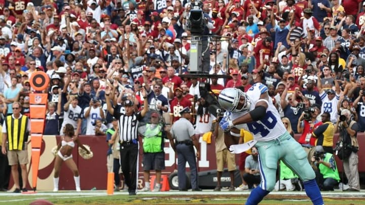 Sep 18, 2016; Landover, MD, USA; Dallas Cowboys running back Alfred Morris (46) celebrates after scoring the go-ahead touchdown against the Washington Redskins in the fourth quarter at FedEx Field. The Cowboys won 27-23. Mandatory Credit: Geoff Burke-USA TODAY Sports