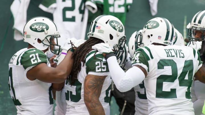 Oct 2, 2016; East Rutherford, NJ, USA; New York Jets cornerback Darrelle Revis (24) New York Jets strong safety Calvin Pryor (25) New York Jets free safety Marcus Gilchrist (21) huddle during pregame with the rest of the secondary at MetLife Stadium. Mandatory Credit: William Hauser-USA TODAY Sports