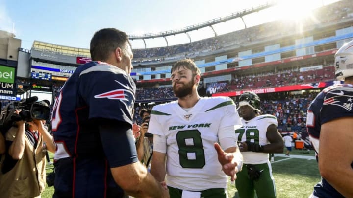 FOXBOROUGH, MA - SEPTEMBER 22: Tom Brady #12 of the New England Patriots shakes hands with Luke Falk #8 of the New York Jets after a game at Gillette Stadium on September 22, 2019 in Foxborough, Massachusetts. (Photo by Billie Weiss/Getty Images)