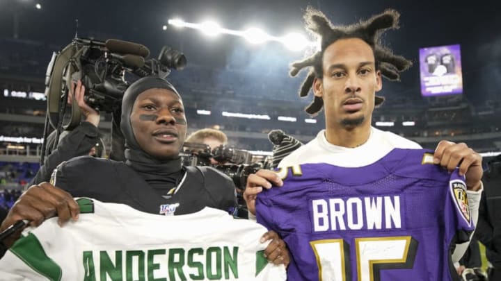 BALTIMORE, MD - DECEMBER 12: Robby Anderson #11 of the New York Jets and Marquise Brown #15 of the Baltimore Ravens exchange jerseys after the game at M&T Bank Stadium on December 12, 2019 in Baltimore, Maryland. (Photo by Scott Taetsch/Getty Images)