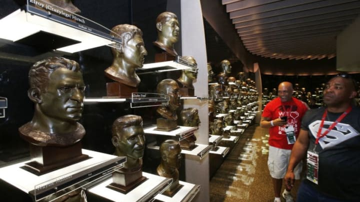 CANTON, OH - AUGUST 9: Fans look at the busts of previous inductees in the Pro Football Hall of Fame prior to the NFL Hall of Fame Game between the Pittsburgh Steelers and Minnesota Vikings at Tom Benson Hall of Fame Stadium on August 9, 2015 in Canton, Ohio. (Photo by Joe Robbins/Getty Images)
