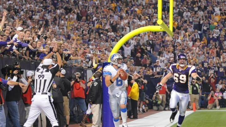 Oct 12, 2008; Minneapolis, MN, USA: Detroit Lions quarterback Dan Orlovsky (6) gets pressure from the Minnesota Vikings and runs out of the end zone for a safety in the first quarter at the Metrodome. Mandatory credit: Bruce Kluckhohn USA TODAY Sports (NFL News)