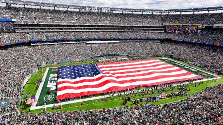 EAST RUTHERFORD, NJ - SEPTEMBER 11: The American flag is spead across the field during the National Anthem prior to the game between the New York Jets and the Cincinnati Bengals at MetLife Stadium on September 11, 2016 in East Rutherford, New Jersey. The Cincinnati Bengals defeated the New York Jets 23-22. (Photo by Steven Ryan/Getty Images)