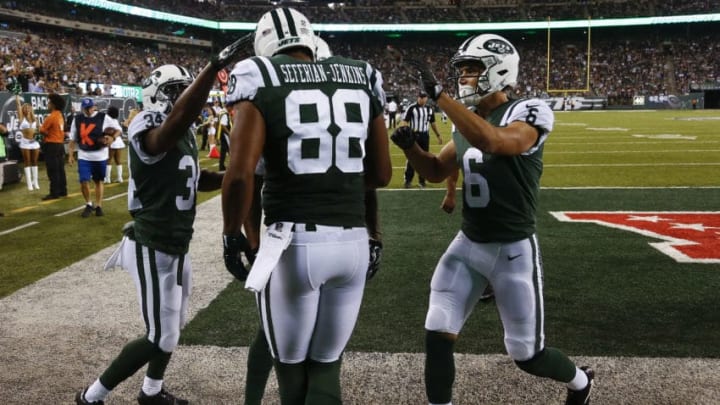 EAST RUTHERFORD, NJ - AUGUST 31: Austin Seferian-Jenkins #88 of the New York Jets celebrates his touchdown with teammates Jeremy Clark #34 and Chad Hansen #6 of the New York Jets during their preseason game against the Philadelphia Eagles at MetLife Stadium on August 31, 2017 in East Rutherford, New Jersey. (Photo by Jeff Zelevansky/Getty Images) EAST RUTHERFORD, NJ - AUGUST 31: Austin Seferian-Jenkins #88 of the New York Jets celebrates his touchdown with teammates Jeremy Clark #34 and Chad Hansen #6 of the New York Jets during their preseason game against the Philadelphia Eagles at MetLife Stadium on August 31, 2017 in East Rutherford, New Jersey. (Photo by Jeff Zelevansky/Getty Images)