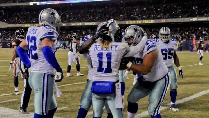 Dec 4, 2014; Chicago, IL, USA; Dallas Cowboys wide receiver Cole Beasley (11) celebrates with teammates after he scores a touchdown in the second half of their game against the Chicago Bears at Soldier Field. The Cowboys won 41-28. Mandatory Credit: Matt Marton-USA TODAY Sports