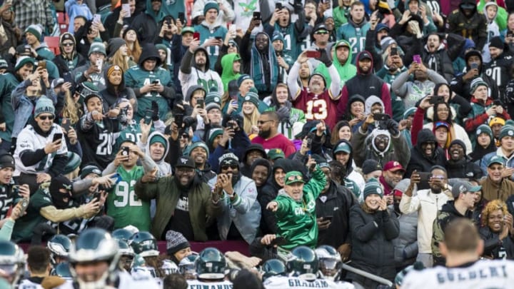 LANDOVER, MD - DECEMBER 15: Fans celebrate with Philadelphia Eagles players after the game against the Washington Redskins at FedExField on December 15, 2019 in Landover, Maryland. (Photo by Scott Taetsch/Getty Images)