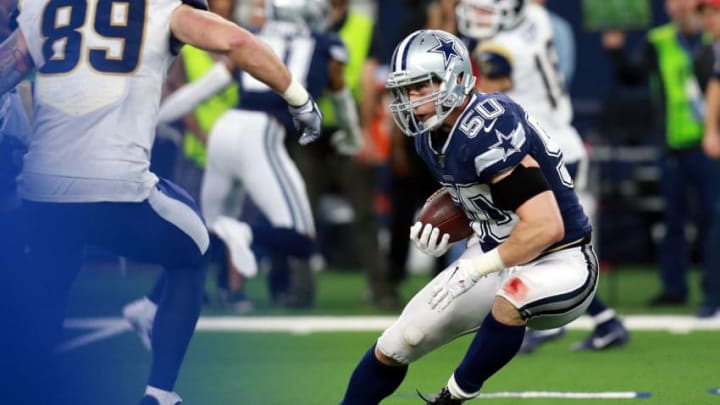 ARLINGTON, TEXAS - DECEMBER 15: Sean Lee #50 of the Dallas Cowboys carries the ball after an interception against the Los Angeles Rams in the second quarter at AT&T Stadium on December 15, 2019 in Arlington, Texas. (Photo by Richard Rodriguez/Getty Images)