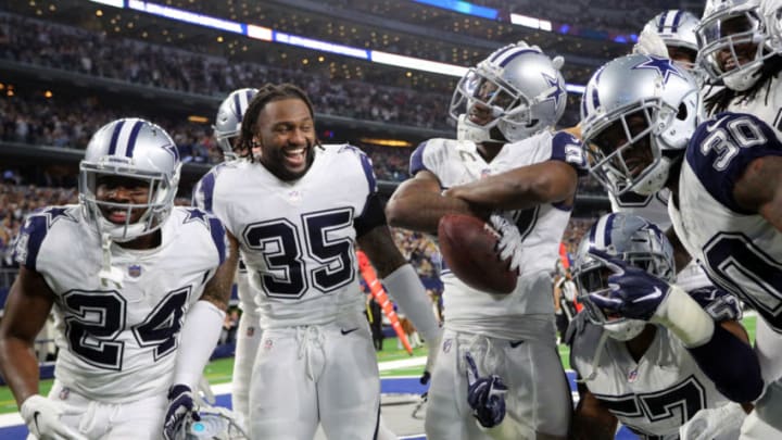 ARLINGTON, TEXAS - NOVEMBER 29: Chidobe Awuzie #24, Kavon Frazier #35 and other Dallas Cowboys celebrate the fourth quarter interception by Jourdan Lewis #27 against the New Orleans Saints at AT&T Stadium on November 29, 2018 in Arlington, Texas. (Photo by Richard Rodriguez/Getty Images)