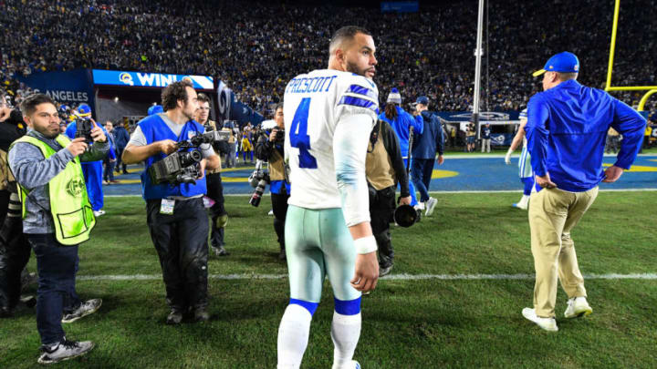 LOS ANGELES, CA - JANUARY 12: Quarterback Dak Prescott #4 of the Dallas Cowboys walks off the field after losing the NFC Divisional Round playoff game to the Los Angeles Rams at Los Angeles Memorial Coliseum on January 12, 2019 in Los Angeles, California. (Photo by Kevork Djansezian/Getty Images)