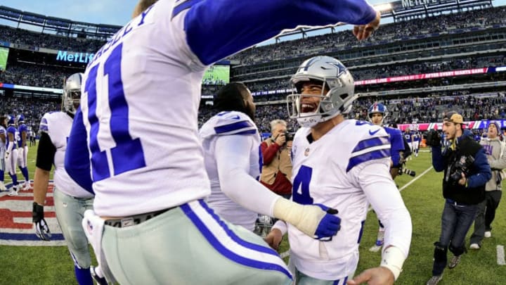 EAST RUTHERFORD, NEW JERSEY - DECEMBER 30: Dak Prescott #4 of the Dallas Cowboys celebrates with his teammate Cole Beasley #11 after their team's 36-35 win over the New York Giants at MetLife Stadium on December 30, 2018 in East Rutherford, New Jersey. (Photo by Steven Ryan/Getty Images)