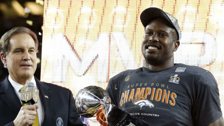 SANTA CLARA, CA - FEBRUARY 07: Super Bowl MVP Von Miller #58 of the Denver Broncos celebrates with the Vince Lombardi Trophy after winning Super Bowl 50 at Levi's Stadium on February 7, 2016 in Santa Clara, California. The Broncos defeated the Panthers 24-10. (Photo by Ezra Shaw/Getty Images)