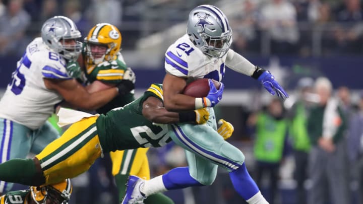 ARLINGTON, TX - JANUARY 15: Ezekiel Elliott #21 of the Dallas Cowboys carries the ball during the fourth quarter against the Green Bay Packers in the NFC Divisional Playoff game at AT&T Stadium on January 15, 2017 in Arlington, Texas. (Photo by Tom Pennington/Getty Images)