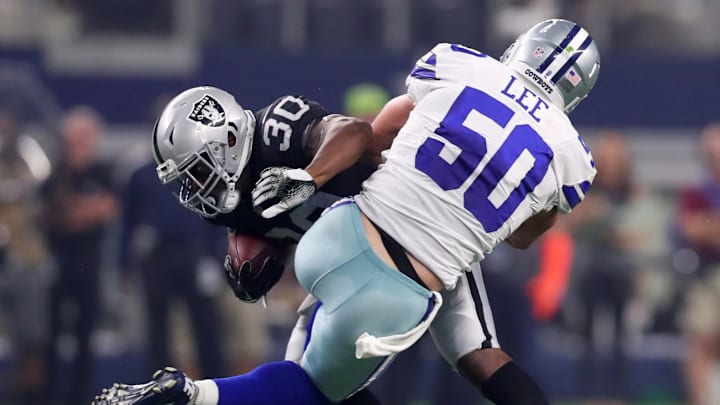 ARLINGTON, TX – AUGUST 26: Jalen Richard #30 of the Oakland Raiders gets hit by Sean Lee #50 of the Dallas Cowboys in the first quarter of a preseason game at AT&T Stadium on August 26, 2017 in Arlington, Texas. (Photo by Tom Pennington/Getty Images)