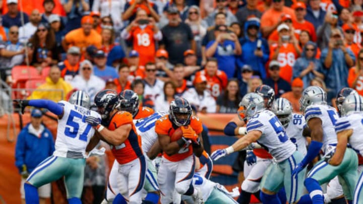 DENVER, CO – SEPTEMBER 17: Running back C.J. Anderson #22 of the Denver Broncos rushes against the Dallas Cowboys in the first quarter of a game at Sports Authority Field at Mile High on September 17, 2017 in Denver, Colorado. (Photo by Justin Edmonds/Getty Images)