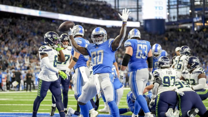 DETROIT, MICHIGAN – OCTOBER 02: Jamaal Williams #30 of the Detroit Lions reacts to scoring a touchdown against the Seattle Seahawks at Ford Field on October 2, 2022, in Detroit, Michigan. (Photo by Nic Antaya/Getty Images)