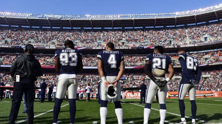 CLEVELAND, OH - NOVEMBER 06: Benson Mayowa #93, Dak Prescott #4, Ezekiel Elliott #21 and Terrance Williams #83 of the Dallas Cowboys stand during the National Anthem at FirstEnergy Stadium on November 6, 2016 in Cleveland, Ohio. (Photo by Jason Miller/Getty Images)