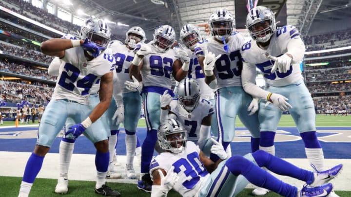 ARLINGTON, TEXAS - NOVEMBER 14: The Dallas Cowboys celebrate an interception by Trevon Diggs #7 of the Dallas Cowboys against the Atlanta Falcons during the third quarter at AT&T Stadium on November 14, 2021 in Arlington, Texas. (Photo by Tom Pennington/Getty Images)