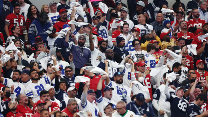 ARLINGTON, TEXAS - JANUARY 16: Dallas Cowboys fans cheer during the first quarter of a game against the San Francisco 49ers in the NFC Wild Card Playoff game at AT&T Stadium on January 16, 2022 in Arlington, Texas. (Photo by Tom Pennington/Getty Images)
