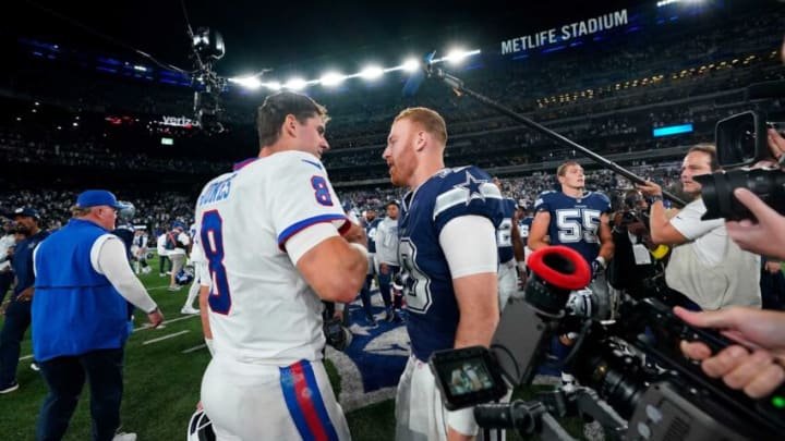 New York Giants quarterback Daniel Jones (8) and Dallas Cowboys quarterback Cooper Rush (10) shake hands after the game. The Giants fall to the Cowboys, 23-16, at MetLife Stadium on Monday, Sept. 26, 2022.Nfl Ny Giants Vs Dallas Cowboys Cowboys At Giants
