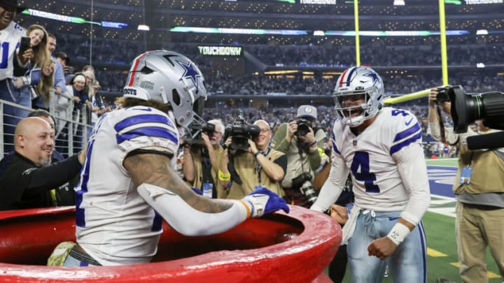 Dec 4, 2022; Arlington, Texas, USA; Dallas Cowboys running back Ezekiel Elliott (21) celebrates with Dallas Cowboys quarterback Dak Prescott (4) after scoring a touchdown during the second half against the Indianapolis Colts at AT&T Stadium. Mandatory Credit: Kevin Jairaj-USA TODAY Sports