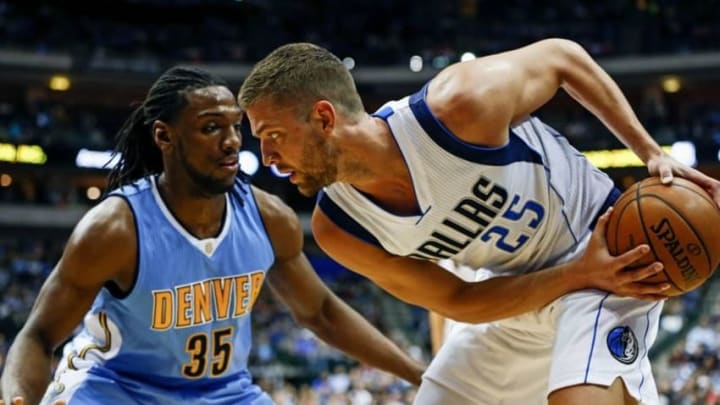 Feb 26, 2016; Dallas, TX, USA; Dallas Mavericks forward Chandler Parsons (25) looks to drive as Denver Nuggets forward Kenneth Faried (35) defends during the first half against the Dallas Mavericks at American Airlines Center. Mandatory Credit: Kevin Jairaj-USA TODAY Sports