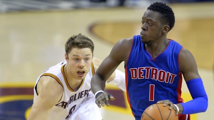 Feb 22, 2016; Cleveland, OH, USA; Detroit Pistons guard Reggie Jackson (1) dribbles against Cleveland Cavaliers guard Matthew Dellavedova (8) in the fourth quarter at Quicken Loans Arena. Mandatory Credit: David Richard-USA TODAY Sports