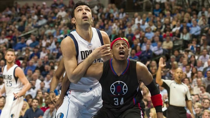 Mar 7, 2016; Dallas, TX, USA; Los Angeles Clippers forward Paul Pierce (34) guards Dallas Mavericks center Zaza Pachulia (27) during the second quarter at the American Airlines Center. Mandatory Credit: Jerome Miron-USA TODAY Sports
