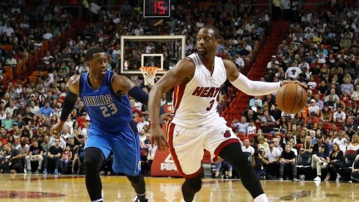 Jan 1, 2016; Miami, FL, USA; Miami Heat guard Dwyane Wade (3) drives to the basket as Dallas Mavericks guard Wesley Matthews (23) defends during the second half at American Airlines Arena. Mandatory Credit: Steve Mitchell-USA TODAY Sports Jan 1, 2016; Miami, FL, USA; Miami Heat guard Dwyane Wade (3) drives to the basket as Dallas Mavericks guard Wesley Matthews (23) defends during the second half at American Airlines Arena. Mandatory Credit: Steve Mitchell-USA TODAY Sports