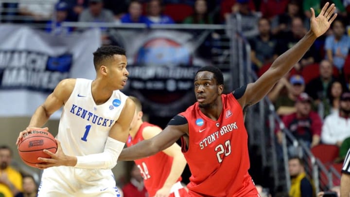 Mar 17, 2016; Des Moines, IA, USA; Kentucky Wildcats forward Skal Labissiere (1) handles the ball against Stony Brook Seawolves forward Jameel Warney (20) during the first half in the first round of the 2016 NCAA Tournament at Wells Fargo Arena. Mandatory Credit: Steven Branscombe-USA TODAY Sports
