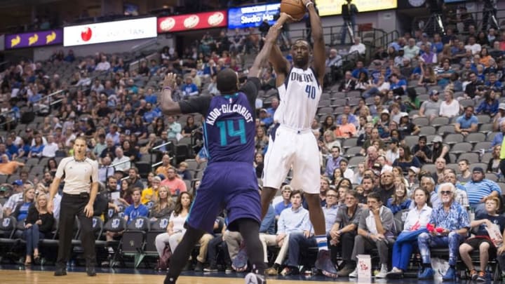 Oct 3, 2016; Dallas, TX, USA; Dallas Mavericks forward Harrison Barnes (40) shoots over Charlotte Hornets forward Michael Kidd-Gilchrist (14) during the first half at the American Airlines Center. Mandatory Credit: Jerome Miron-USA TODAY Sports