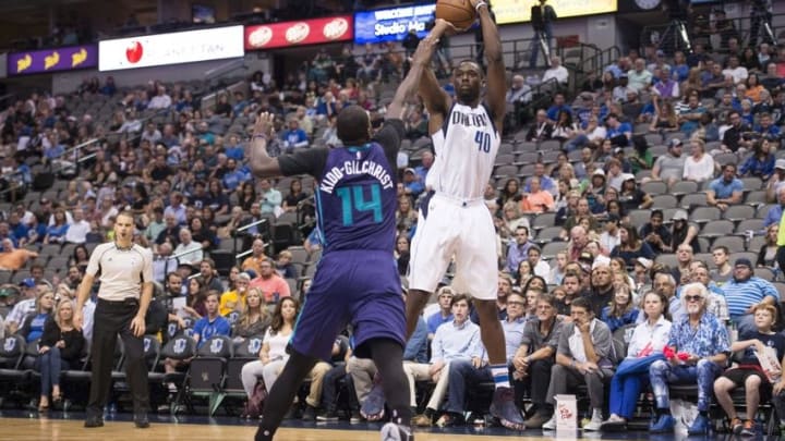 Oct 3, 2016; Dallas, TX, USA; Dallas Mavericks forward Harrison Barnes (40) shoots over Charlotte Hornets forward Michael Kidd-Gilchrist (14) during the first half at the American Airlines Center. Mandatory Credit: Jerome Miron-USA TODAY Sports Oct 3, 2016; Dallas, TX, USA; Dallas Mavericks forward Harrison Barnes (40) shoots over Charlotte Hornets forward Michael Kidd-Gilchrist (14) during the first half at the American Airlines Center. Mandatory Credit: Jerome Miron-USA TODAY Sports