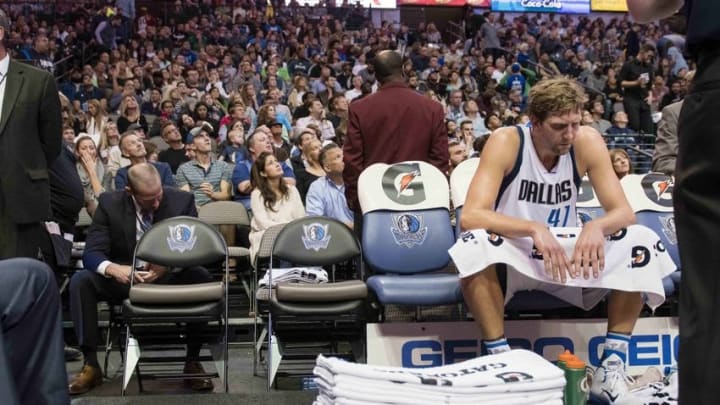 Nov 23, 2016; Dallas, TX, USA; Dallas Mavericks forward Dirk Nowitzki (41) sits on the team bench during the second quarter of the game against the LA Clippers at the American Airlines Center. Mandatory Credit: Jerome Miron-USA TODAY Sports
