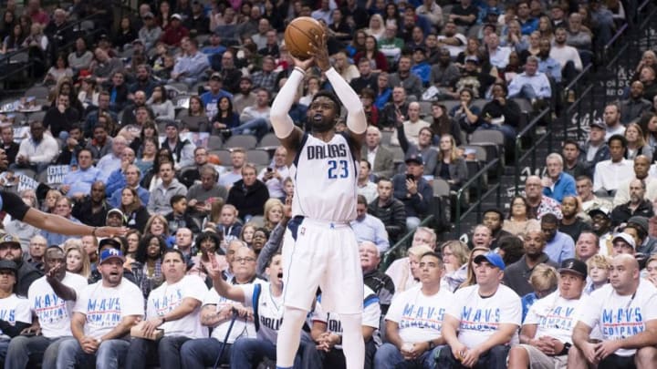 Dec 12, 2016; Dallas, TX, USA; Dallas Mavericks guard Wesley Matthews (23) makes a three point shot against the Denver Nuggets during the second quarter at American Airlines Center. Mandatory Credit: Jerome Miron-USA TODAY Sports